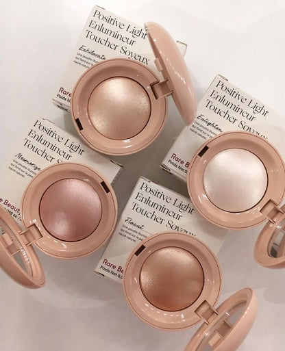 Rare Beauty Silky Radiance Powder Highlighter – Weightless Glow.