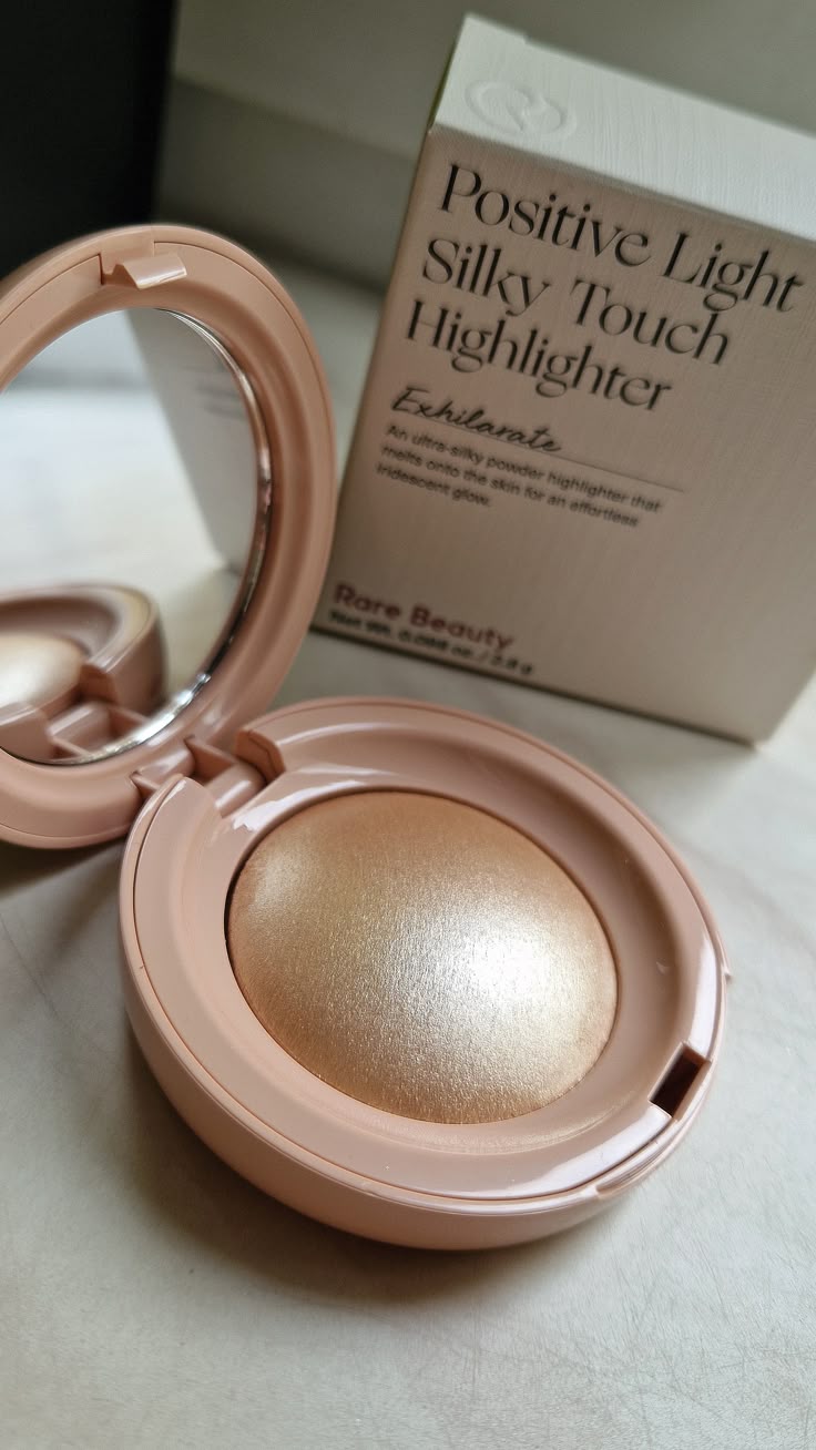 Rare Beauty Silky Radiance Powder Highlighter – Weightless Glow.
